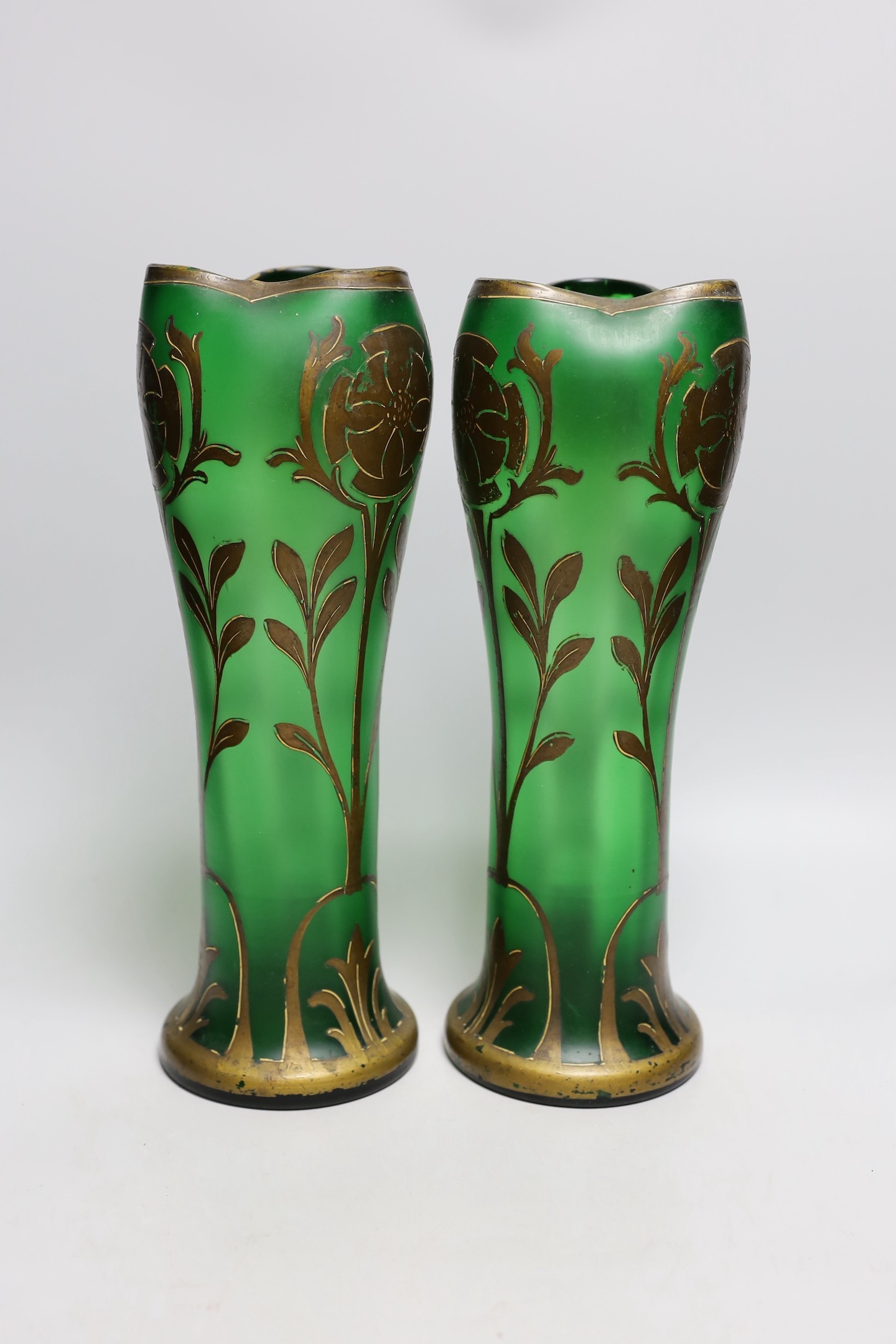 A pair of French green glass and gilt decorated Art Nouveau vases, 34cms high